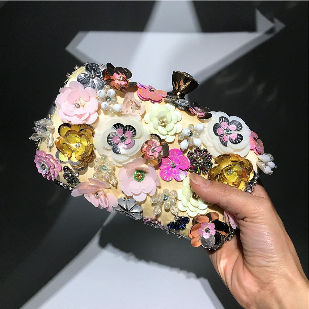 Floral satin clutch, flower detail