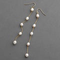 Freshwater pearl shoulder-duster earrings, ivory