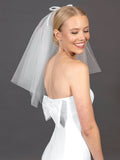 Short party veil with bow