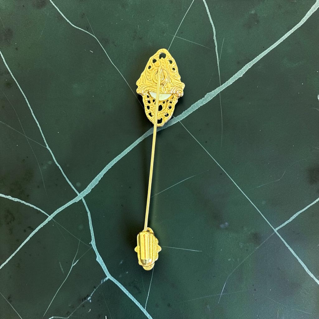 Vintage filigree stick pin with filigree clutch