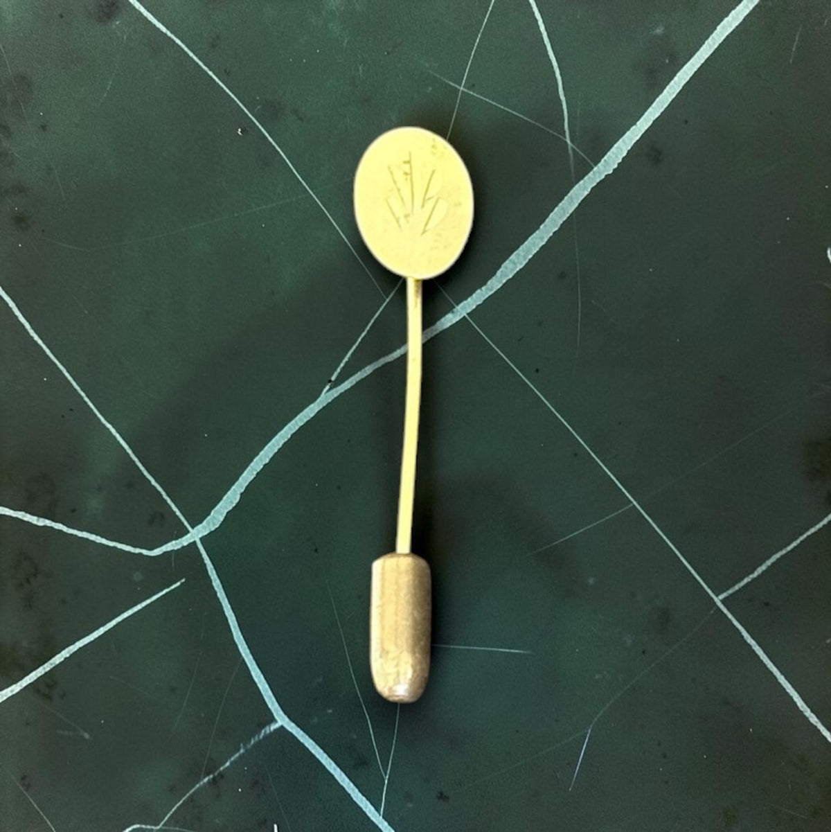 Vintage engraved oval stick pin, gold-tone