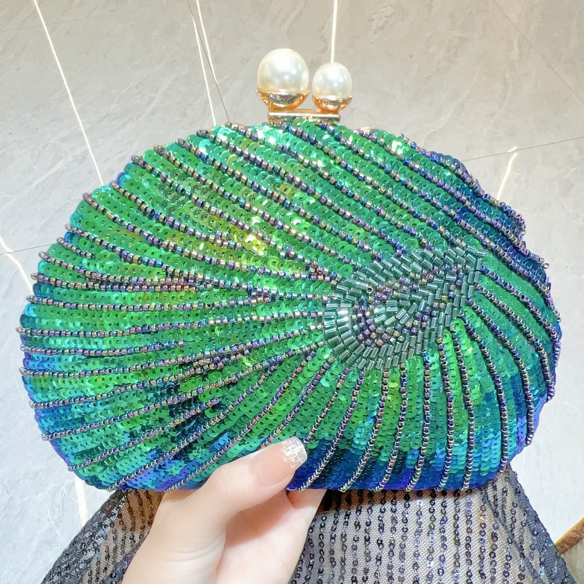 Beaded seashell evening clutch with pearl clasp